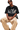 Mr Enjoy Da Money MEDM SS25 Lace Pigeon Gem Tee styled with casual pants and sunglasses