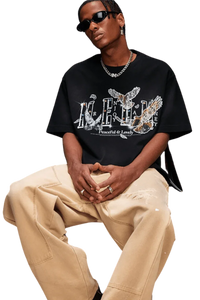 Mr Enjoy Da Money MEDM SS25 Lace Pigeon Gem Tee styled with casual pants and sunglasses