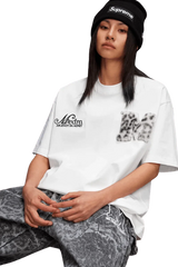 Mr Enjoy Da Money MEDM SS25 Leopard Fur Big M Tee in white, worn with stylish gray patterned pants