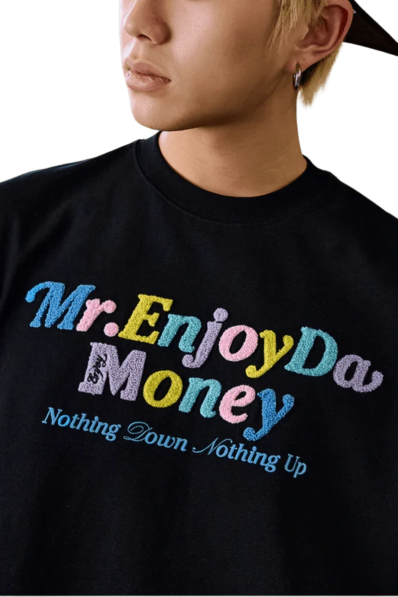 MEDM SS25 Macaron Velvet Embossed Tee in black featuring colorful text design by Mr Enjoy Da Money
