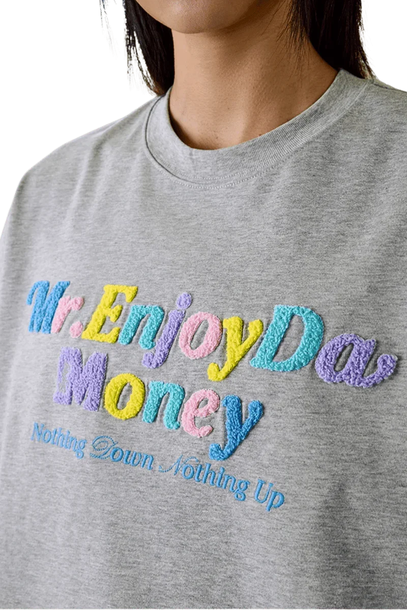 MEDM SS25 Macaron Velvet Embossed Tee in grey with colorful Mr Enjoy Da Money lettering