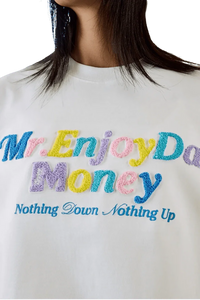 MEDM SS25 Macaron Velvet Embossed Tee featuring colorful embroidered text design by Mr Enjoy Da Money