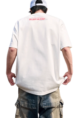 Men's MEDM SS25 Neon Spray Paint Tee in white, featuring a bold logo on the back for streetwear enthusiasts
