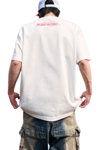 Men's MEDM SS25 Neon Spray Paint Tee in white, featuring a bold logo on the back for streetwear enthusiasts