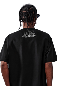 Back view of MEDM SS25 Rhinestone Tee by Mr Enjoy Da Money featuring logo detail on a black shirt