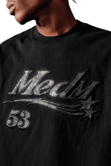 Close-up of MEDM SS25 Rhinestone Tee in black featuring shimmering rhinestone details