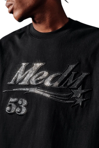 Close-up of MEDM SS25 Rhinestone Tee in black featuring shimmering rhinestone details