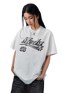 MEDM SS25 Rhinestone Tee in white featuring bold graphics and relaxed fit for stylish comfort