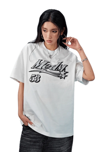 MEDM SS25 Rhinestone Tee in White, featuring bold logo design on a comfortable oversized fit