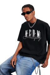 MEDM SS25 Serendipity Embroidery Tee in black with bold logo and stylish design for modern fashion