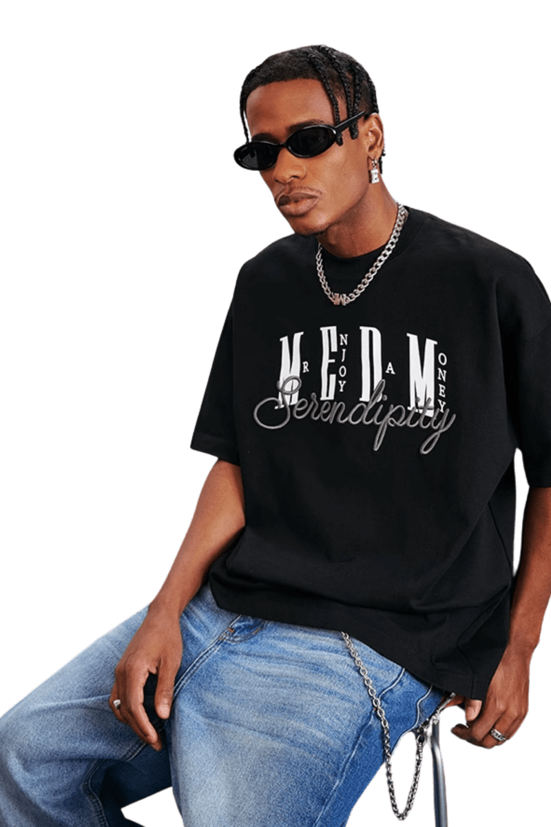 MEDM SS25 Serendipity Embroidery Tee in black with bold logo and stylish design for modern fashion