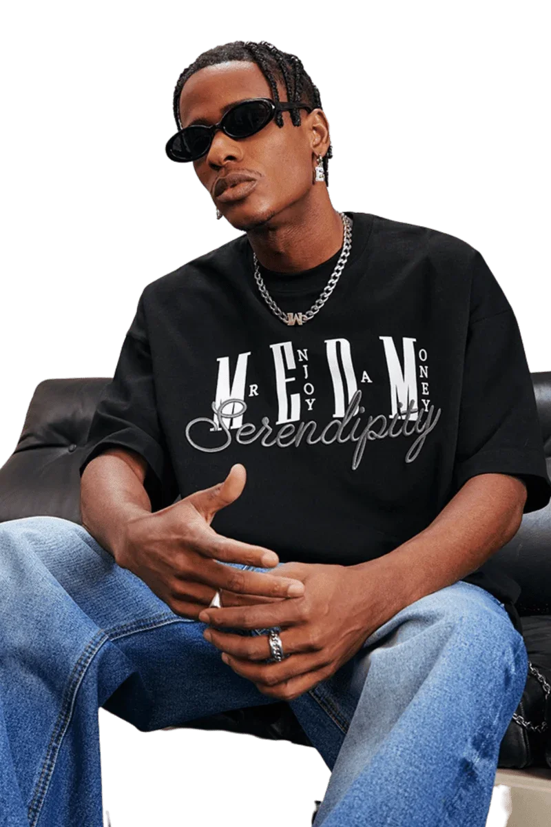 MEDM SS25 Serendipity Embroidery Tee in Black with Bold Lettering and Relaxed Fit