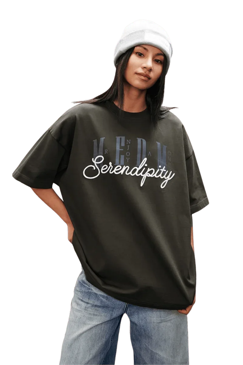 MODEL wearing MEDM SS25 Serendipity Embroidery Tee with relaxed fit and stylish design