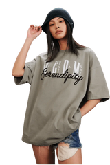 Model wearing a MEDM SS25 Serendipity Embroidery Tee in gray with stylish oversized fit