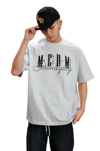 Gray MEDM SS25 Serendipity Embroidery Tee with relaxed fit and stylish design for casual wear