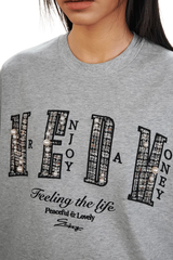 MEDM SS25 Small Pearl Tee in Grey with Pearl Embellishments and Bold Text Design