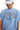 MEDM SS25 Small Pearl Tee in light blue featuring unique lettering and comfortable fit for casual wear
