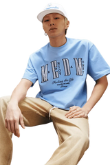MEDM SS25 Small Pearl Tee in light blue featuring Mr Enjoy Da Money graphic design
