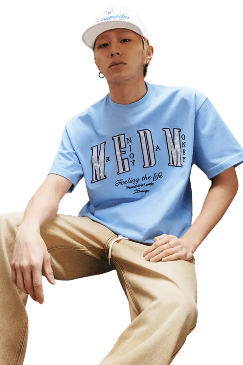 MEDM SS25 Small Pearl Tee in light blue featuring Mr Enjoy Da Money graphic design