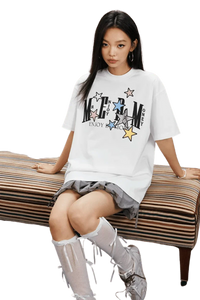 White MEDM SS25 Snake Star Patch Tee featuring colorful graphic design and relaxed fit style