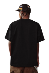 Black MEDM SS25 Snake Year Limited Edition Tee showcasing a relaxed fit for casual wear
