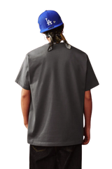 Back view of the MEDM SS25 Snake Year Limited Edition Tee in gray, worn by a model with a blue cap
