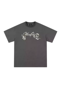 MEDM SS25 Snake Year Limited Edition Tee in dark grey with unique graphic design and relaxed fit