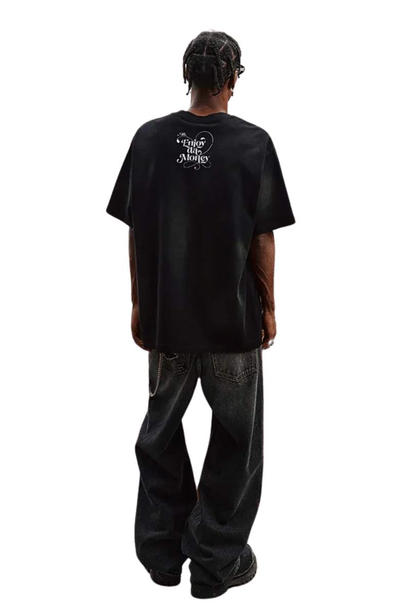 Men's MEDM SS25 Washed Angel Butterfly Tee in black with graphic design on the back