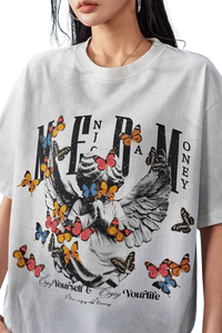 MEDM SS25 Washed Angel Butterfly Tee with vibrant butterfly designs and bold lettering