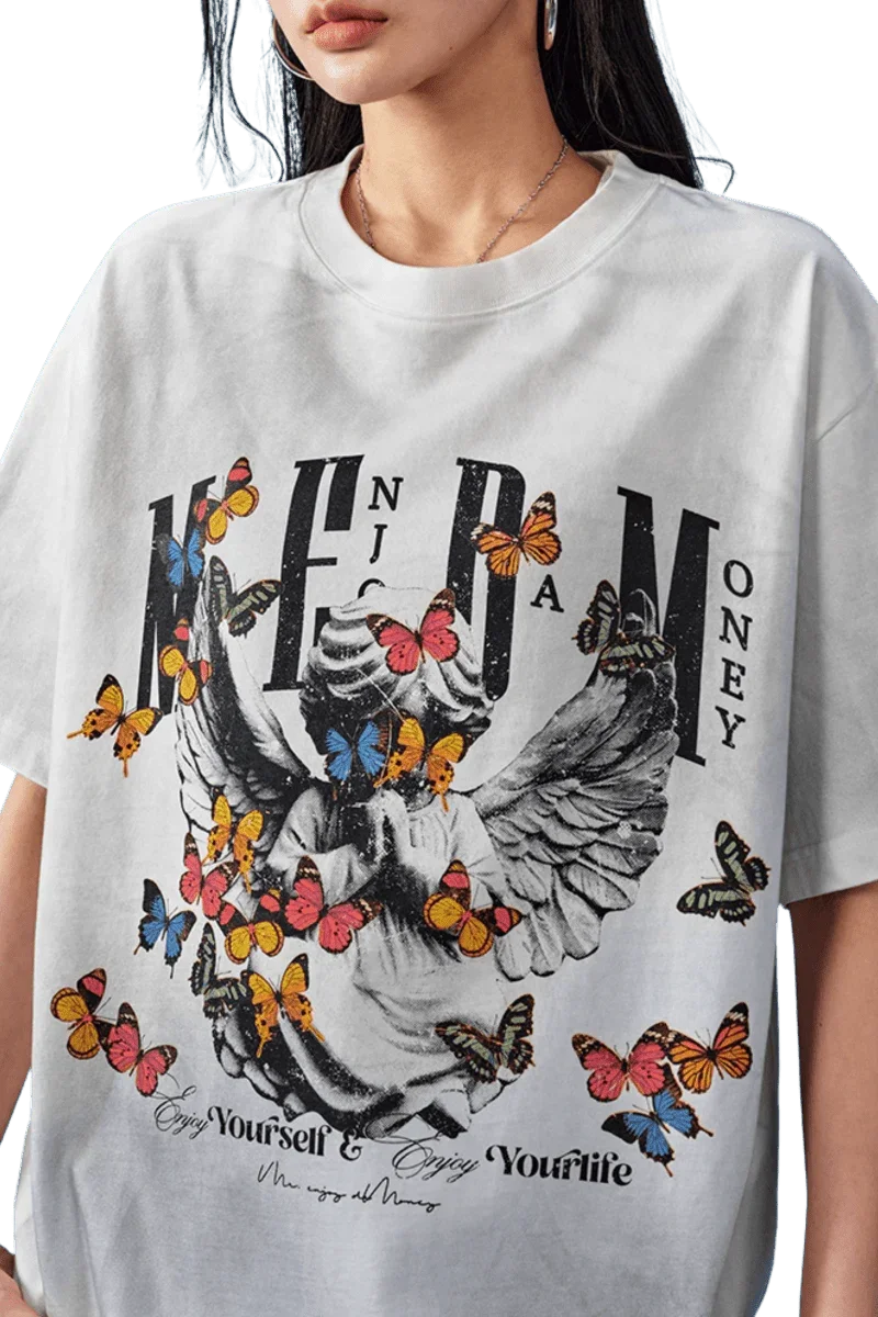 MEDM SS25 Washed Angel Butterfly Tee with vibrant butterfly designs and bold lettering