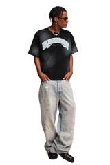 Man wearing MEDM SS25 Washed Arch Logo Tee with relaxed fit and casual style for everyday wear