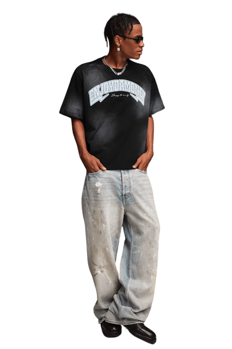 Man wearing MEDM SS25 Washed Arch Logo Tee with relaxed fit and casual style for everyday wear