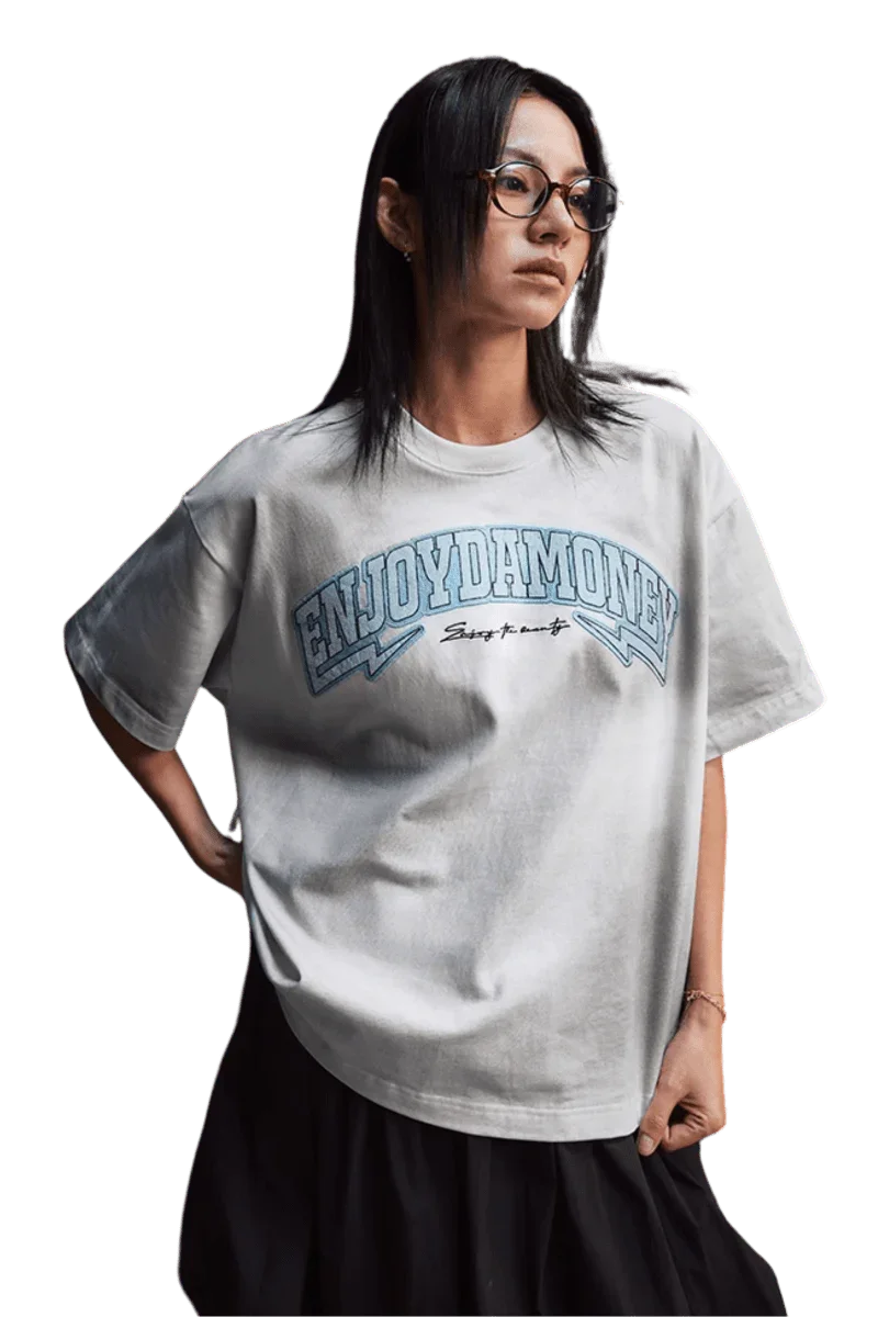 MEDM SS25 Washed Arch Logo Tee in light gray with unique Enjoy Da Money graphic design