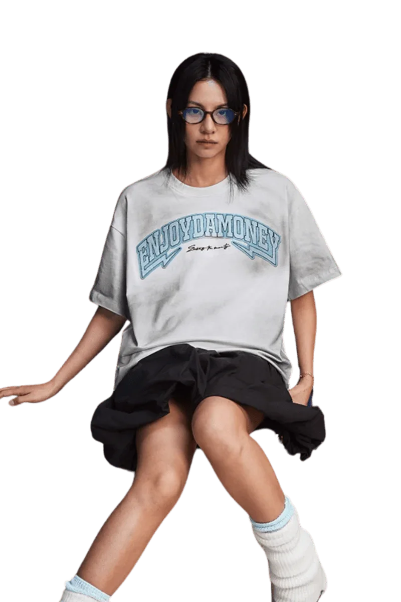 MEDM SS25 Washed Arch Logo Tee in grey featuring a stylish oversized fit and unique graphic design.