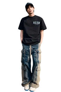 Men's black MEDM Three Colour Print Tee paired with casual cargo jeans for a trendy streetwear look