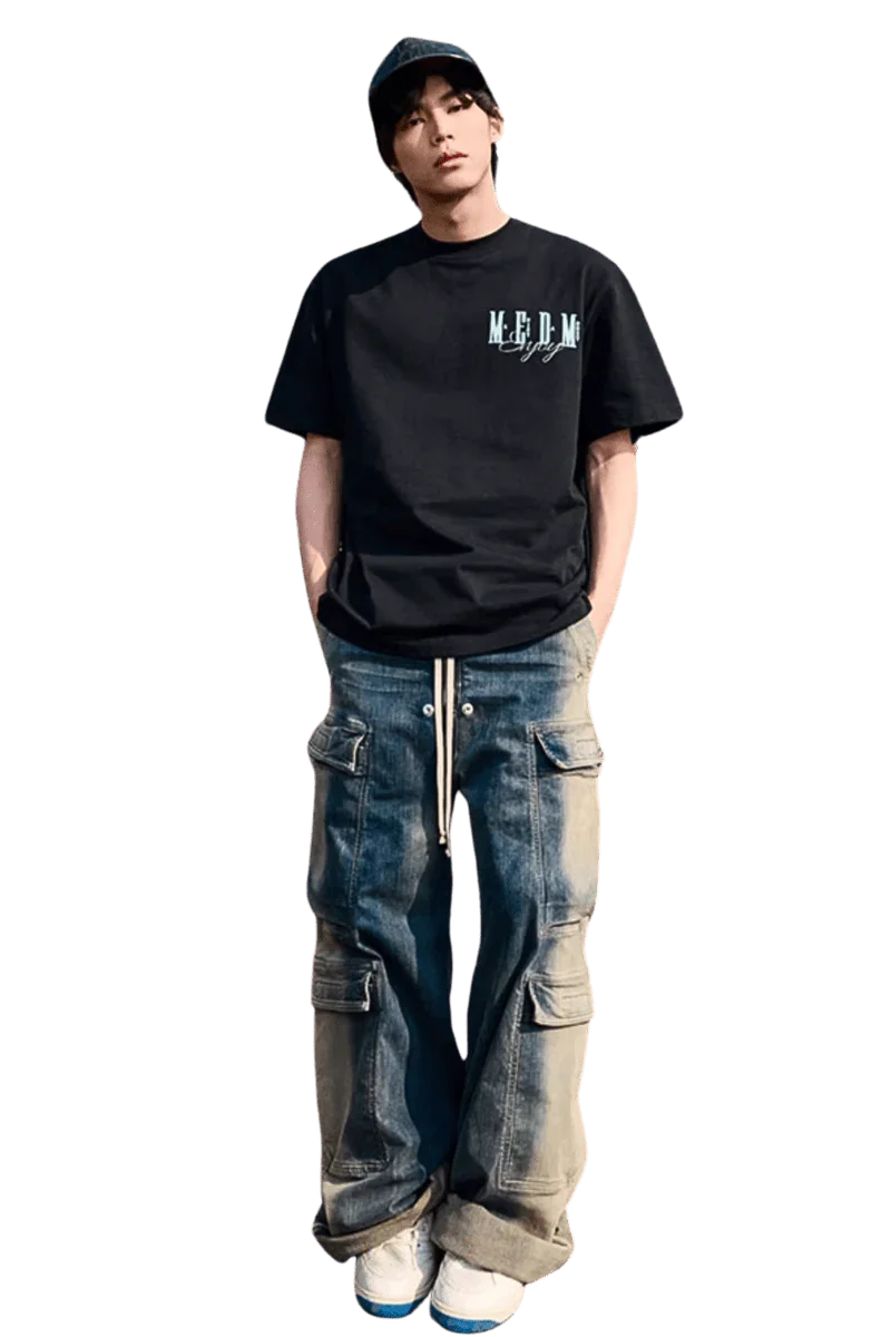 Men's black MEDM Three Colour Print Tee paired with casual cargo jeans for a trendy streetwear look