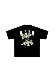Black MEDM White Rose Embroidery Tee with white rose design and stylized text on the back
