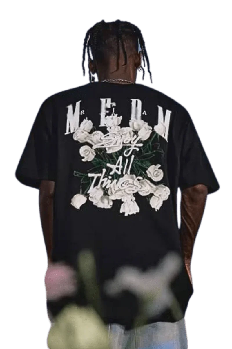Back view of MEDM White Rose Embroidery Tee black shirt with white rose design worn by male model