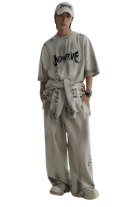 Masonprince Vintage Patch Tee worn by model with matching pants and cap in gray tones
