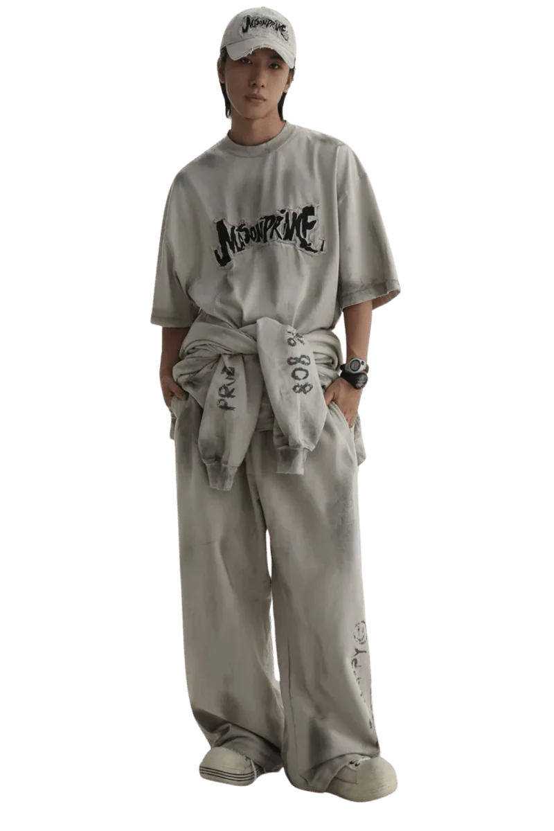 Masonprince Vintage Patch Tee worn by model with matching pants and cap in gray tones