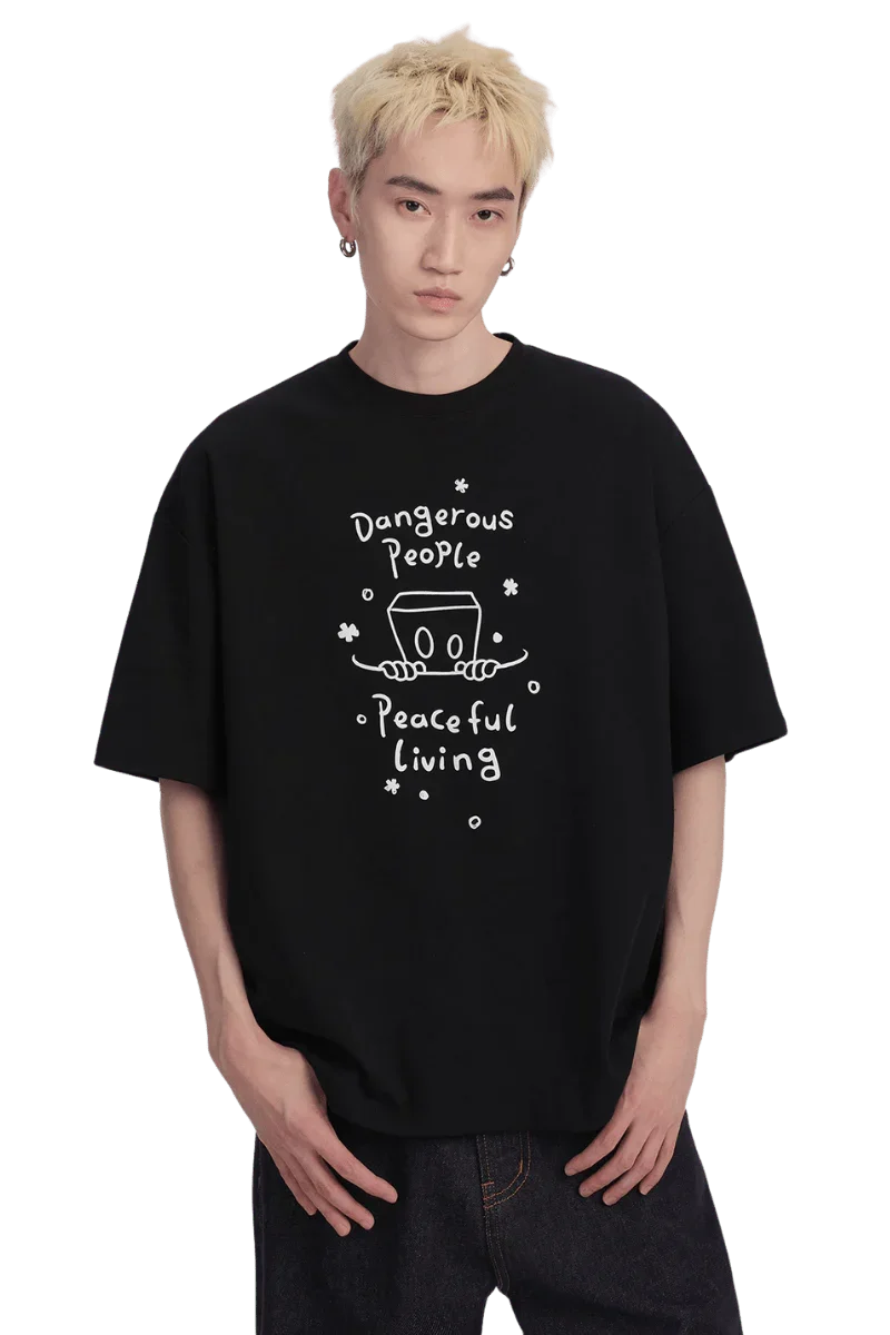 Dangerous People Peaceful Living Hand Painted Tee in black featuring a unique graphic design
