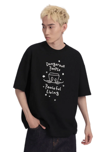 Dangerous People Peaceful Living Hand Painted Tee in black featuring unique graphic design