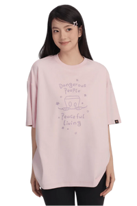 Dangerous People Peaceful Living Hand Painted Tee in soft pink featuring a unique artistic design