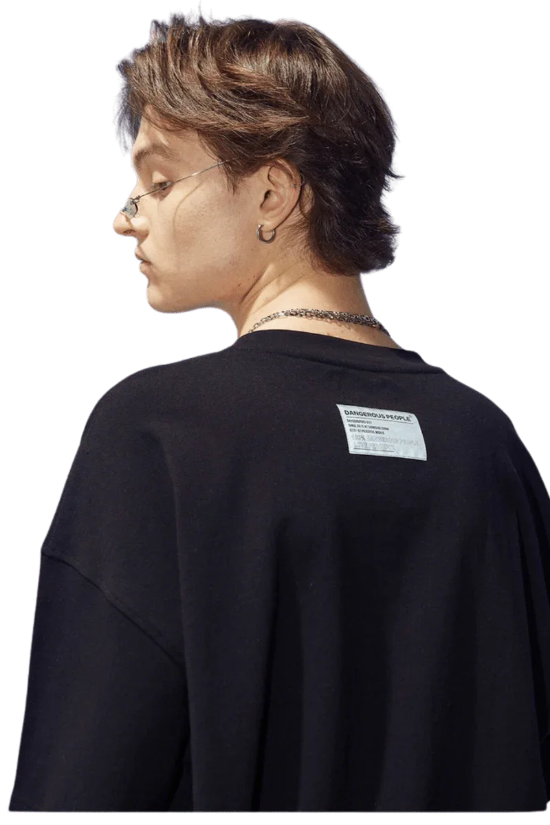 Back view of a Dangerous People black t-shirt featuring reflective wording t-shirt style