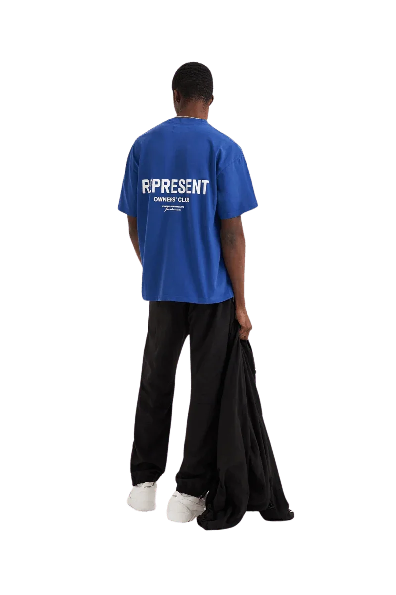 Back view ofRepresent Owners Club T-Shirt in blue worn by a model with relaxed fit