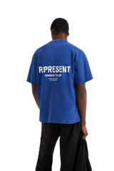 Blue Represent Owners Club T-Shirt featuring a bold logo on the back for a stylish streetwear look