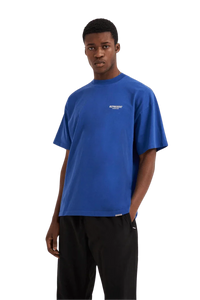 Model wearing blue Represent Owners Club T-Shirt with a relaxed fit and casual style