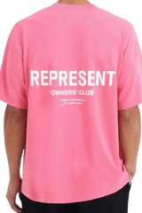 Pink Represent Owners Club T-Shirt featuring bold white lettering on the back for a trendy streetwear look
