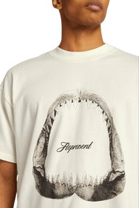 Represent Shark Jaws Tee featuring a graphic shark mouth design on a cream-colored shirt