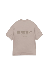 SS24 Owners Club Rubber Logo T-Shirt in beige with bold back printing for casual style